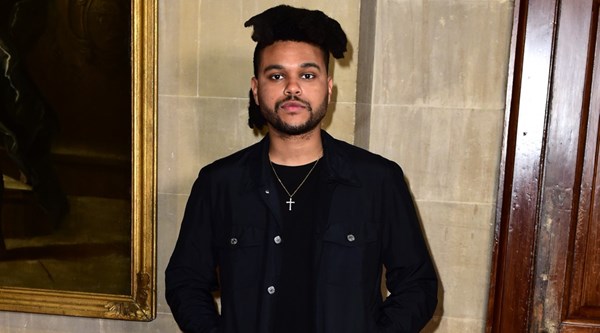 The Weeknd has cut off his famous hair for his Starboy album cover