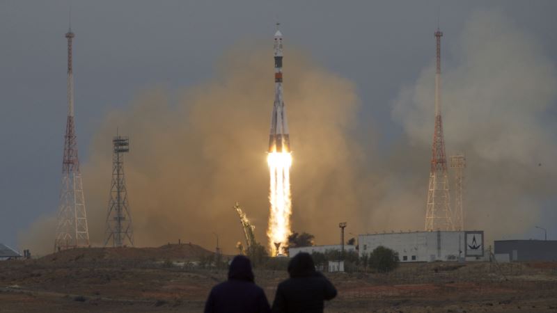 Soyuz Capsule Docks With International Space Station
