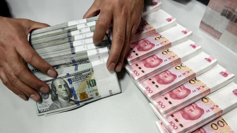 China Currency Dips to Lowest Level Versus Dollar in 8 Years