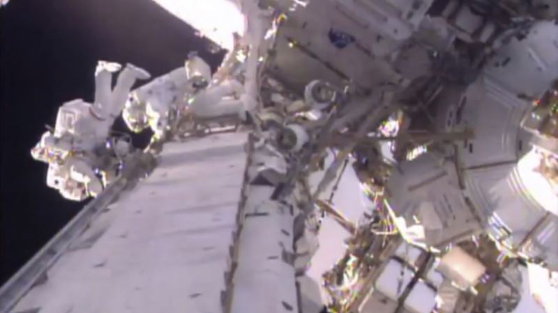Spacewalking Astronauts Upgrade Orbiting Lab’s Power Grid