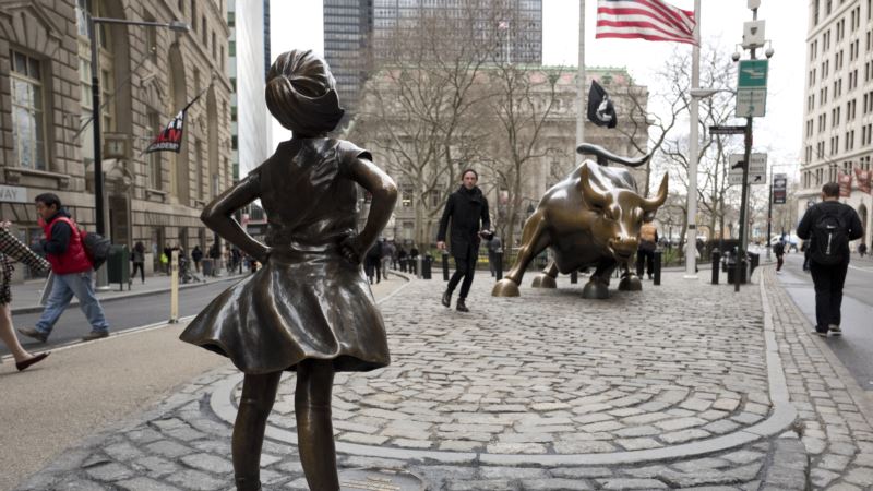 ‘Fearless Girl’ Statue Stares Down Wall Street’s Iconic Bull