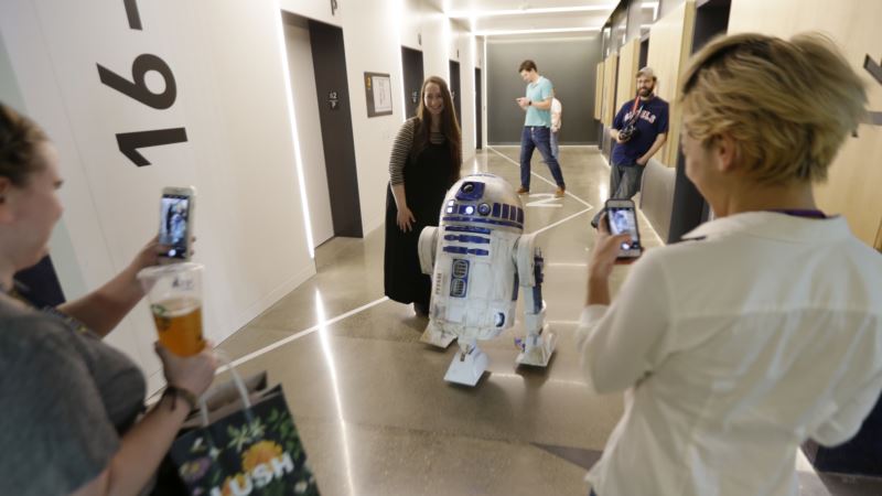 R2-D2, Lightsaber: Force Strong in Star Wars Auction
