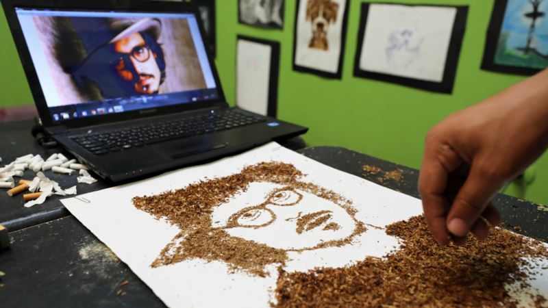 Egyptian Artist Creates Portraits out of Burnt Tobacco