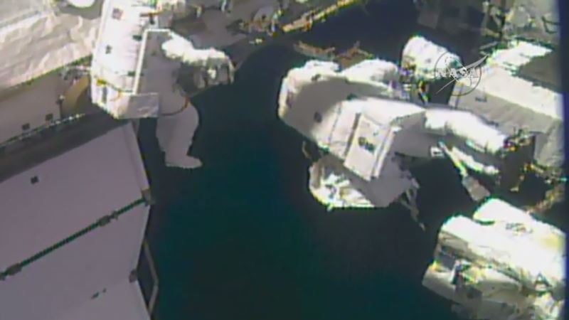Spacewalking Astronauts Grease Robot Arm’s New Hand