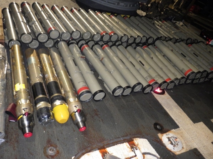  The crew of the USS Normandy seized this illicit shipment of weapons and weapon components intended for the Houthis in Yemen, aboard a stateless dhow in the Arabian Sea, Feb. 9, 2020. (U.S. Navy photo)  