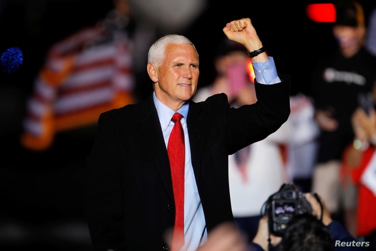 U.S. Vice President Mike Pence makes a fist at the end of a rally in Kinston, North Carolina, U.S., October 25, 2020.   REUTERS…