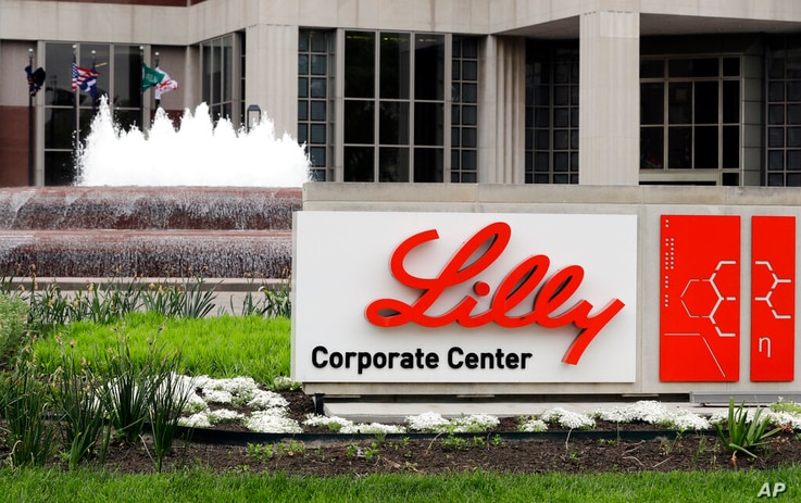 FILE - This is an April 26, 2017, file photo showing Eli Lilly corporate headquarters in Indianapolis. Eli Lilly continues to…