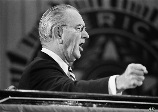 U.S. President Lyndon Johnson slams his fist on the podium for emphasis as he tells legionnaires on Tuesday, Sept. 11,1968 that…