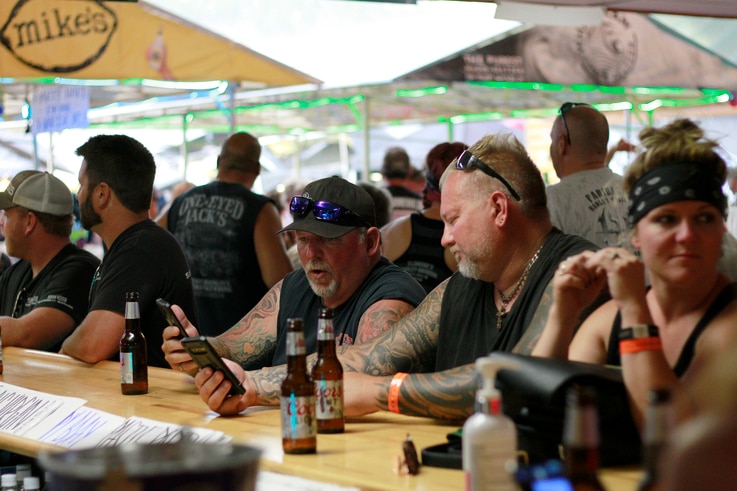 People congregates at One-Eyed Jack's Saloon during the 80th annual Sturgis Motorcycle Rally on Aug. 7, 2020, in Sturgis, South…