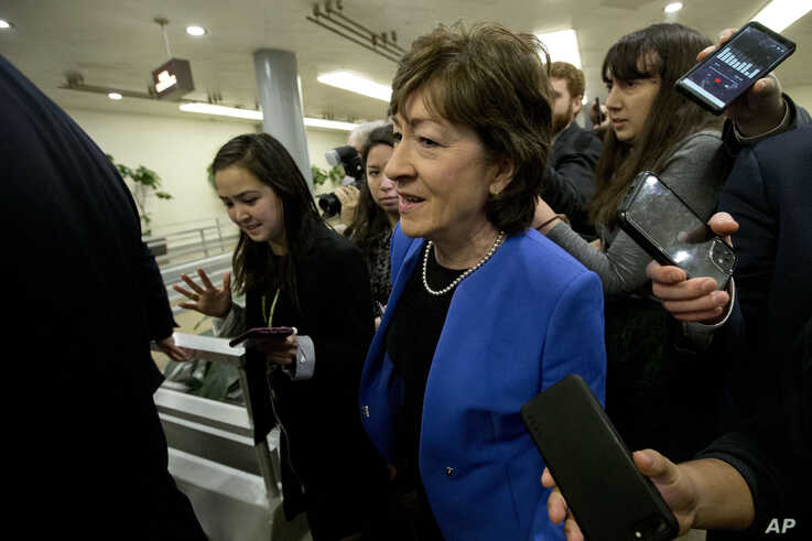 Senators Susan Collins R-ME talks to reporters before attending the impeachment trial of President Donald Trump on charges of…