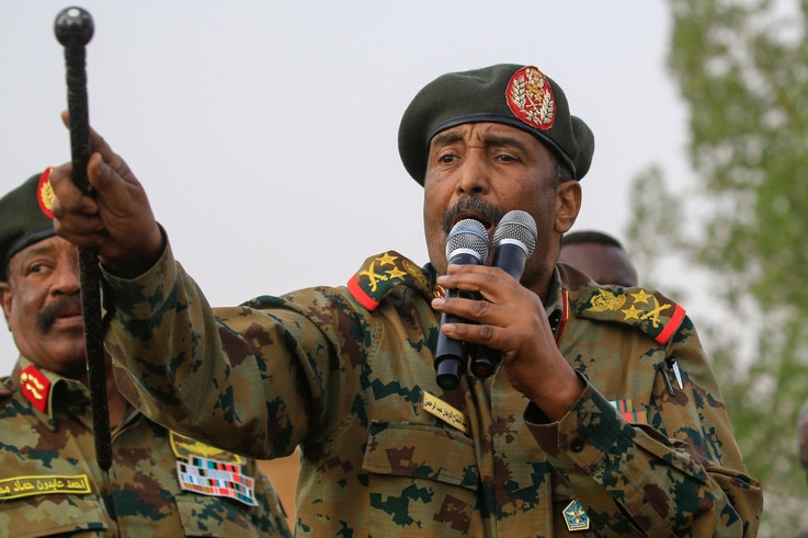 FILE - General Abdel Fattah al-Burhan, the head of Sudan's ruling military council, addresses the crowd in Khartoum's twin city of Omdurman, June 29, 2019. 