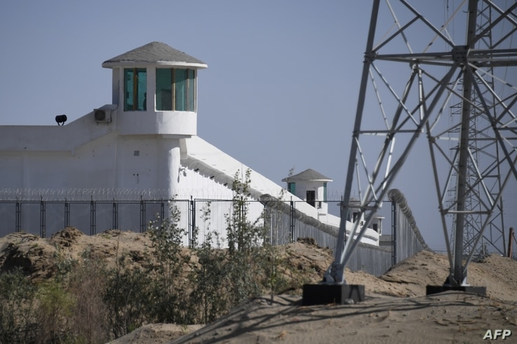 (FILES) this file photo taken on May 30, 2019 shows watchtowers on a high-security facility near what is believed to be a re…