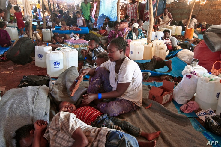 Ethiopian refugees who fled fighting in Tigray province lay in a hut at the Um Rakuba camp in Sudan's eastern Gedaref province,…