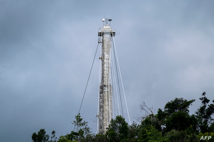 One of three concrete support towers for the Arecibo Observatory radio telescope is seen in Arecibo, Puerto Rico on November 19…