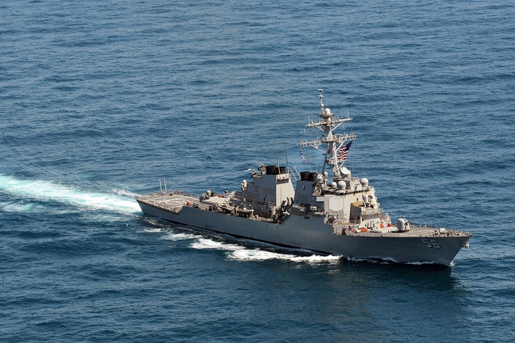 FILE - The guided-missile destroyer USS John S. McCain sails in formation during exercise Foal Eagle 2013 in waters west of the Korean peninsula in this March 21, 2013 handout photo courtesy of the U.S. Navy. 