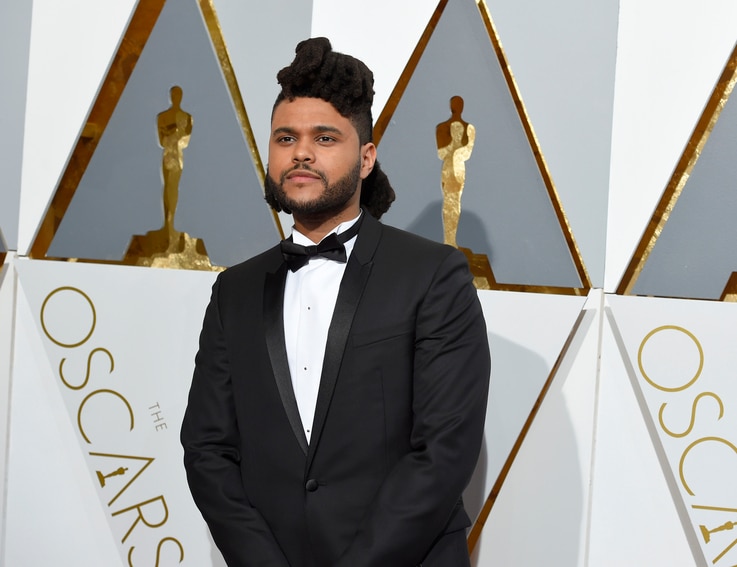 The Weeknd arrives at the Oscars on Feb. 28, 2016, at the Dolby Theatre in Los Angeles. 