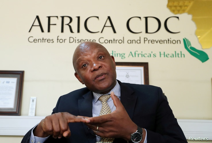 FILE PHOTO: John Nkengasong, Africa's Director of the Centers for Disease Control (CDC), speaks during an interview with…