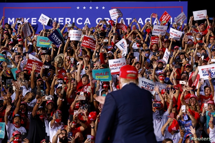 U.S. President Donald Trump arrives at a campaign rally at Miami-Opa Locka Executive Airport in Opa-Locka, Florida, U.S.,…