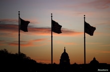 The U.S. Capitol is seen at sunrise during the election day, in Washington, Nov. 3, 2020. 