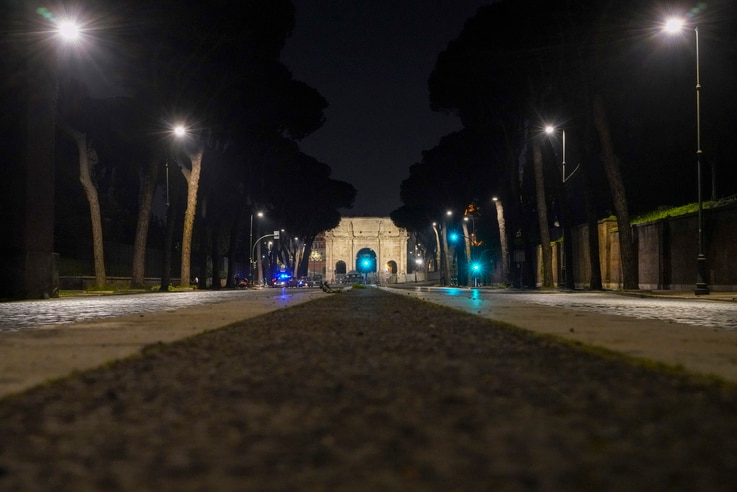 An empty street is seen after 10 p.m. on the first day of the national night time curfew due to new coronavirus measures, in…