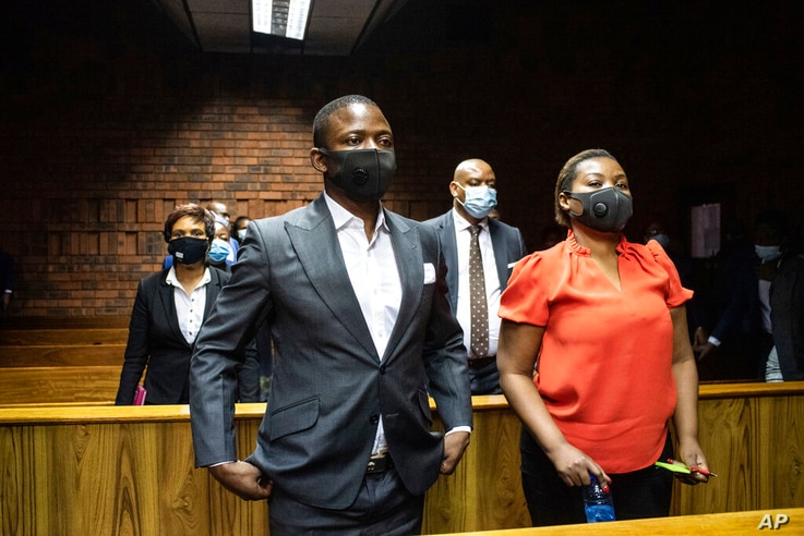Self proclaimed prophet Shepherd Bushiri and his wife Mary, right, in the magistrates court in Pretoria, South Africa, Friday,…