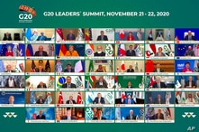 This handout photo provided by G20 Riyadh Summit, shows Saudi King Salman, center, and the rest of world leaders during a…