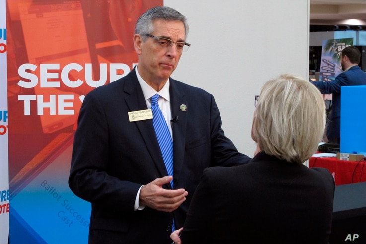 Georgia Secretary of State Brad Raffensperger attends a conference of local election officials in Savannah, Georgia, Dec. 11, 2019. 
