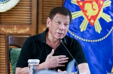 FILE - Philippine President Rodrigo Duterte attends a meeting with members of the Inter-Agency Task Force on the Emerging Infectious Diseases in Davao province, southern Philippines, Aug. 17, 2020.