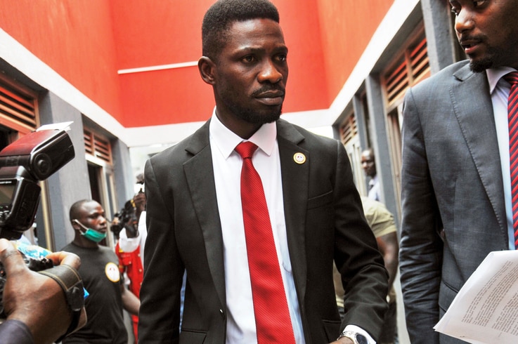Bobi Wine, center, a singer and lawmaker whose real name is Kyagulanyi Ssentamu, arrives to speak at the National Unity…