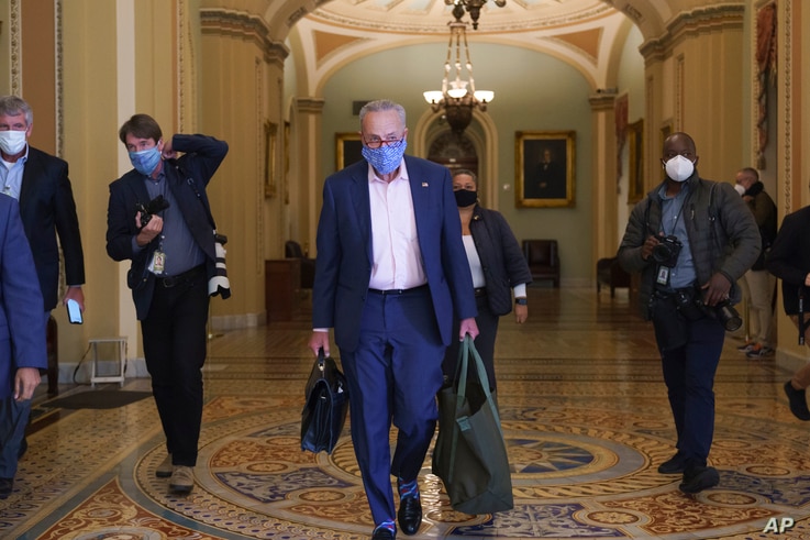 Senate Minority Leader Chuck Schumer, D-N.Y., arrives at the Capitol in Washington, Sept. 21, 2020. 