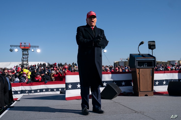 President Donald Trump arrives for a campaign rally at Dubuque Regional Airport, Nov. 1, 2020, in Dubuque, Iowa. 