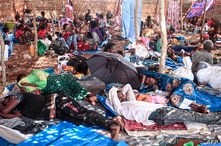 Ethiopian refugees who fled fighting in Tigray province lay in a hut at the Um Rakuba camp in Sudan's eastern Gedaref province, Nov. 16, 2020.