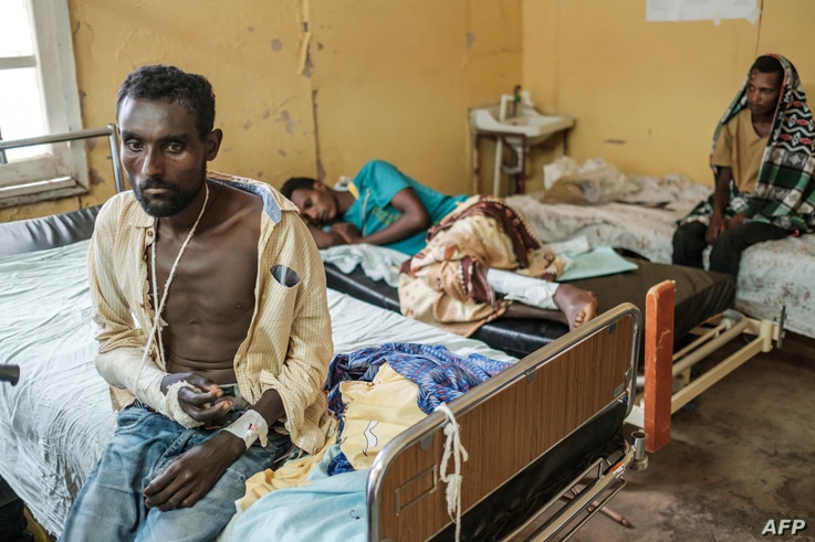 Survivors of the Mai Kadra massacre, recover at the Gondar University Hospital, in the city of Gondar, Ethiopia, Nov. 20, 2020.