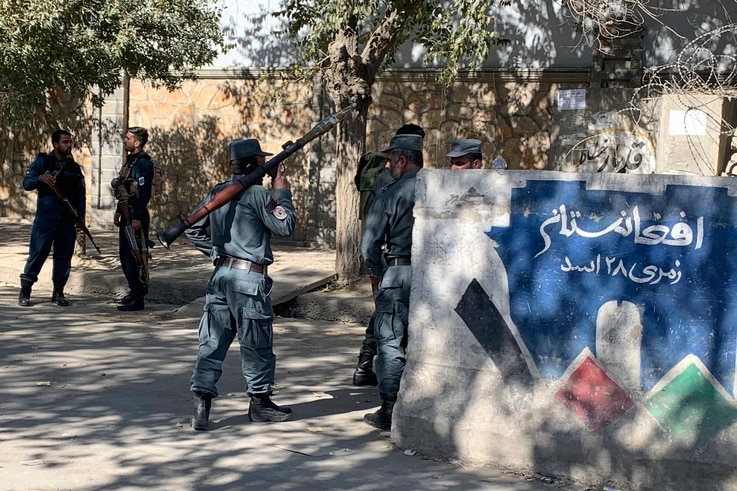 Afghan police arrive at the site of an attack at Kabul University in Kabul, Afghanistan, Monday, Nov. 2, 2020. Gunfire erupted…