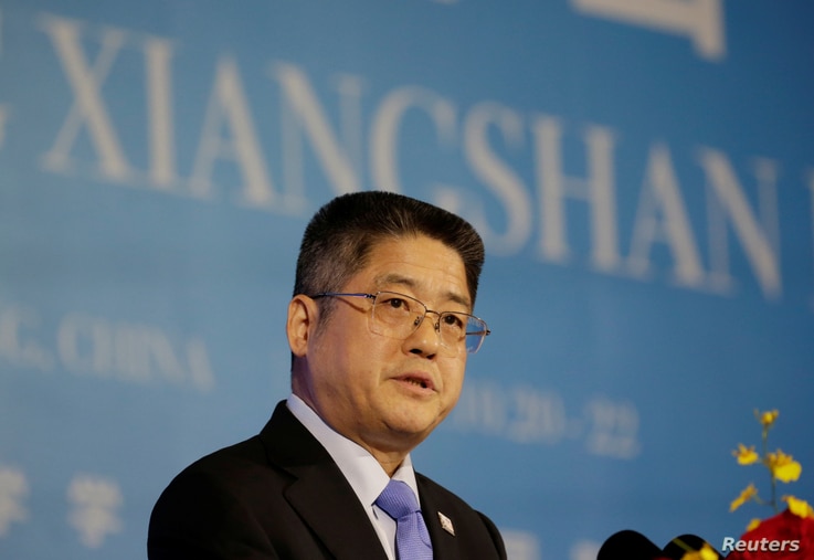 FILE - China's Vice Foreign Minister Le Yucheng speaks at a forum in Beijing, China, Oct. 22, 2019.