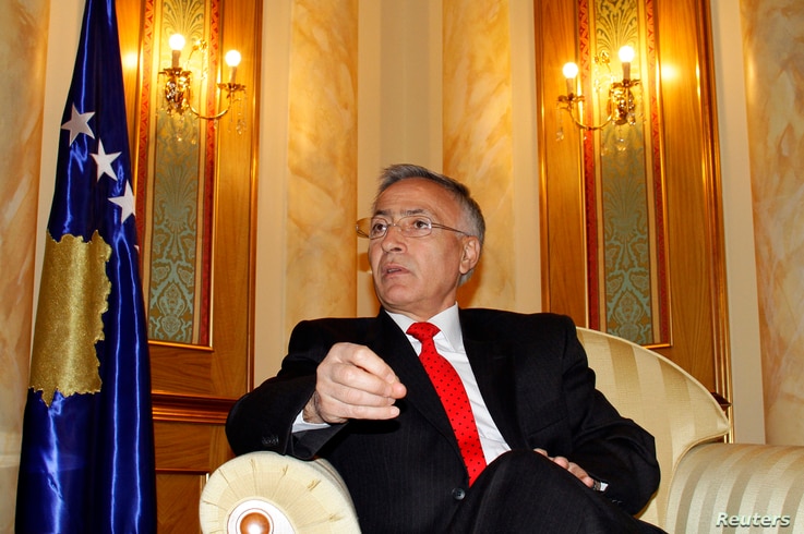 Acting Kosovo's President Jakup Krasniqi speaks during an interview with Reuters in Pristina, Oct. 11,2010.