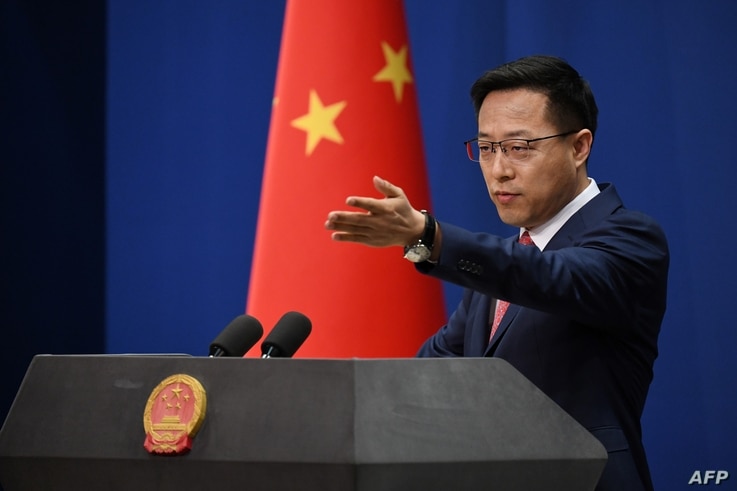 Chinese Foreign Ministry spokesman Zhao Lijian takes a question at the daily media briefing in Beijing on April 8, 2020. (Photo…