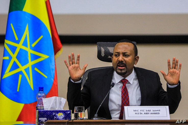 Ethiopian Prime Minister Abiy Ahmed gestures at the House of Peoples Representatives in Addis Ababa, Ethiopia, on November 30,…