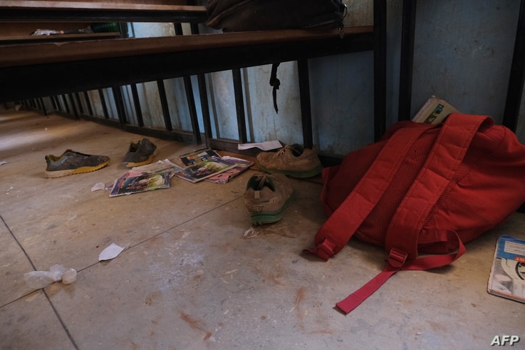 School bags and wares belonging to pupils at the Government Science school are seen on the floor where gunmen abducted students…