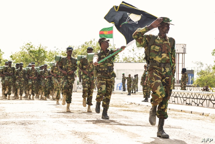 Somalian army special commando unit (DANAB) marches during the 54th Anniversary of the Somali National Army held at the Army…