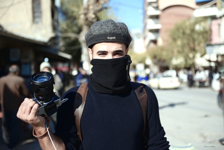 Journalist Rebaz Majeed, pictured covering anti-government protests in the Iraqi Kurdistan city, Sulaymaniyah on Dec. 3, 2020. (Courtesy, Fareq Halabjayi)