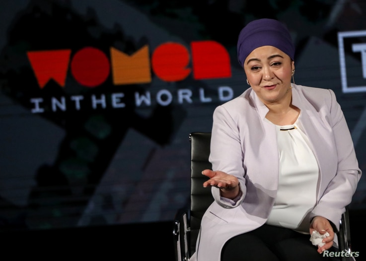 Gulchehra Hoja, Uyghur journalist at Radio Free Asia, speaks on stage at the Women In The World Summit in New York, U.S., April…