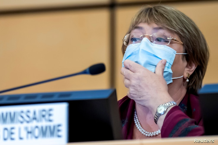 United Nations' High Commissioner for Human Rights Michelle Bachelet adjusts her mask during the opening of 45th session of the…