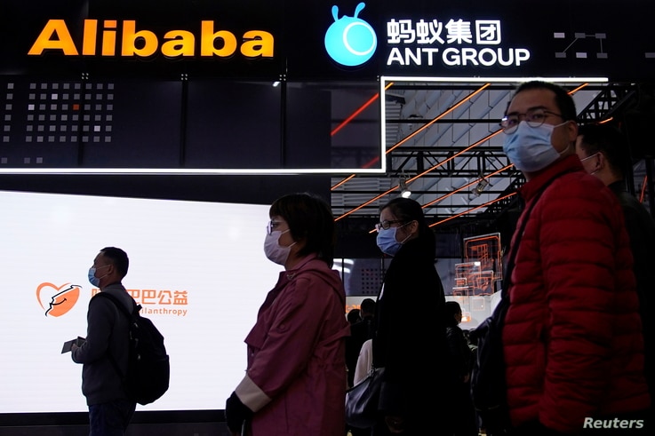 Signs of Alibaba Group and Ant Group are seen during the World Internet Conference (WIC) in Wuzhen, Zhejiang province, China,…