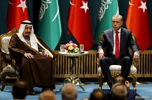 FILE PHOTO: Turkey's President Tayyip Erdogan (R) and Saudi King Salman attend a ceremony in Ankara, Turkey April 12, 2016…
