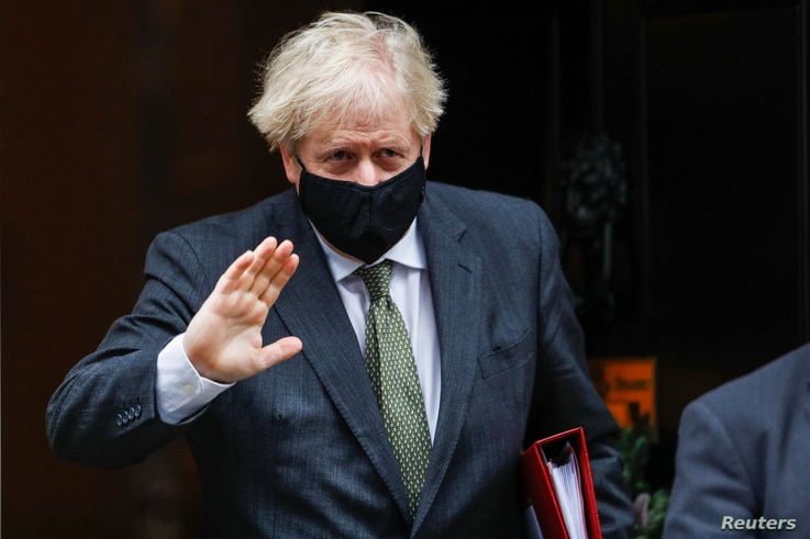 Britain's Prime Minister Boris Johnson gestures as he leaves Downing Street in London, Britain December 9, 2020. REUTERS/Peter…