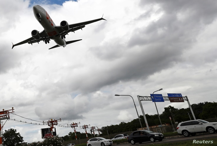 A Boeing 737 Max airplane of Brazilian airlines GOL Linhas Aereas prepares to land at Salgado Filho airport in Porto Alegre,…