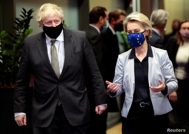 European Commission President Ursula von der Leyen welcomes British Prime Minister Boris Johnson in Brussels, Belgium December…