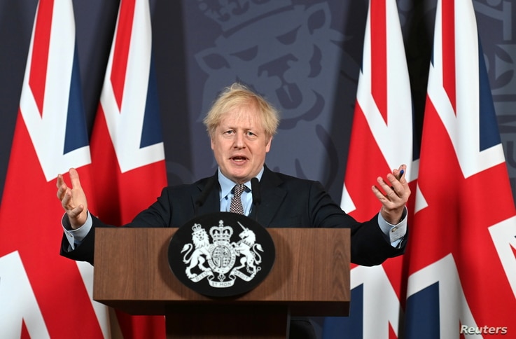 British Prime Minister Boris Johnson holds a news conference in Downing Street on the outcome of the Brexit negotiations, in…