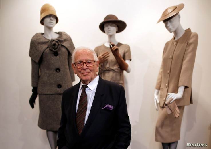 FILE PHOTO: French fashion designer Pierre Cardin poses in front of his 1954-1956-1957 fashion creations in his museum called …